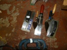 Bag Containing Assorted Bricklayers Trowels and Floats