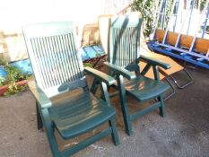 Pair of Green Plastic Folding Chairs