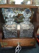 Two Crystal Decanters in a Tantalus with Key