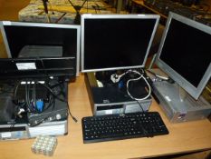Assorted Desktop Computers with Three Flatscreen Monitors, Keyboards, Speakers, Etc