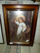 Framed Print of a Girl with Flowers