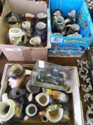 Three Boxes Containing Toby Jugs