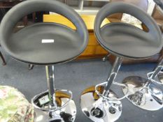 *Pair of Black Gas Lift Barstools