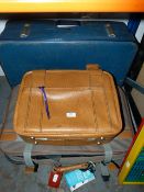 Three Assorted Suitcases