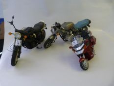 Four Model Motorcycles
