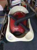 Hoover Vacuum Cleaner and a Baby Bath