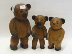 THREE CARVED WOOD TEDDY BEARS