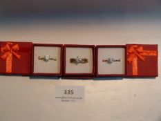 THREE DRESS RINGS WITH INSET STONES