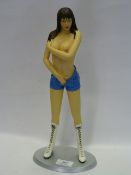 SEMI-NUDE FIGURINE IN DENIM SHORTS