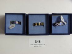 THREE STAINLESS STEEL DRESS RINGS