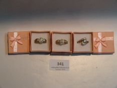 THREE DRESS RINGS WITH INSET STONES