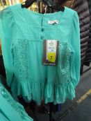 *TWO GIRLS BLOUSES (GREEN) AND TROUSERS (BLUE) AGE:7