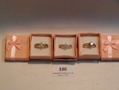 THREE DRESS RINGS WITH STONES