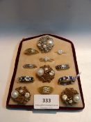 TWELVE ASSORTED DRESS RINGS