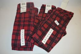 *FOUR PAIRS OF JEANS (BLACK AND RED CHECKED) SIZE: 6