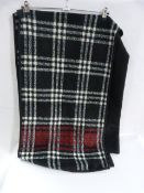 *LADIES REVERSIBLE THROW (BLACK AND WHITE CHECKED)