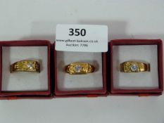 THREE DRESS RINGS SET WITH STONES
