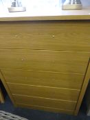*LIGHT OAK FIVE HEIGHT CHEST OF DRAWERS