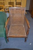 Cane Seated and Mahogany Armchair