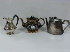 Two Silver Plated and One Pottery Teapots
