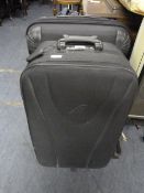 Three Pull Along Suitcases