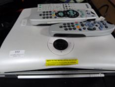 DVD Player and a Sky Box with Remotes