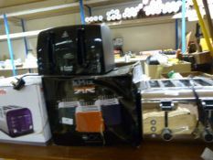 *Four Electric Toasters