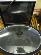 Flat Screen TV, a Slow Cooker and a Lamp