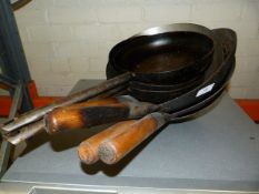 Four Woks and Three Fry Pans
