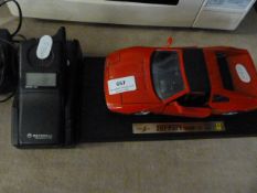 Early Motorola Telephone and a Ferrari