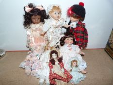 Eight Pot Headed Dolls