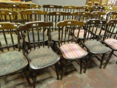 Seven Hardwood Spindleback Dining Chairs with Upholstered Seats