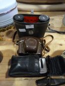 Binoculars, Zeiss Camera and a Canon Camera