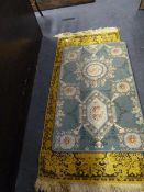 Yellow Patterned Rug and a Jade Green Rug
