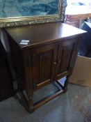 Small Oak Two Door Cabinet with Linen Fold Panels