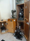 *Four Laboratory Microscopes