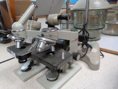 *Four Laboratory Microscopes