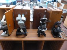 *Four Laboratory Microscopes