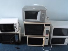 *Seven Microwave Ovens