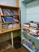 *Contents of Two Bookcases Which Include Various Educational Books