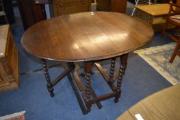 Oak Oval Topped Drop Leaf Dining Table on Barley Twist Legs