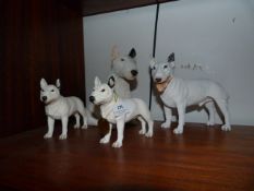 Four Polyresin Dogs