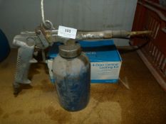 Pneumatic Spray Gun and a Central Locking Kit