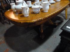 Carved Oak Oval Occasional Table on Ball and Claw Feet