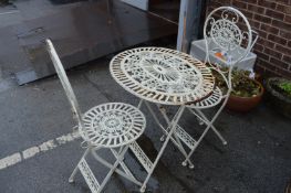 Cast Metal Oval Topped Garden Table and Two Folding Chairs