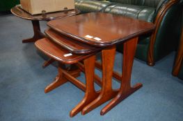 Mahogany Net of Three Tables and a Oval Topped Coffee Table