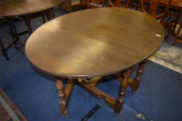 Oak Drop Leaf Oval Topped Dining Table