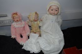 Three Porcelian Dolls