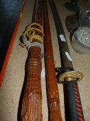 Decorative Samurai Sword and a Carved Teak Ceremonial Sword