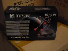 *Box Containing Six Lesson LS1203 200w Four Channel Amplifiers